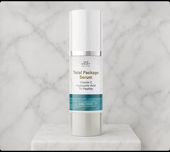 SunCoast Serum 30 ml bottle on marble. Product photo from the campaign.